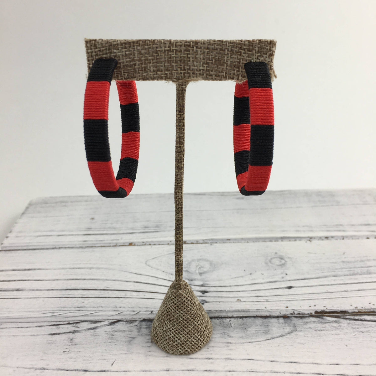 Red and black threaded hoop earrings
