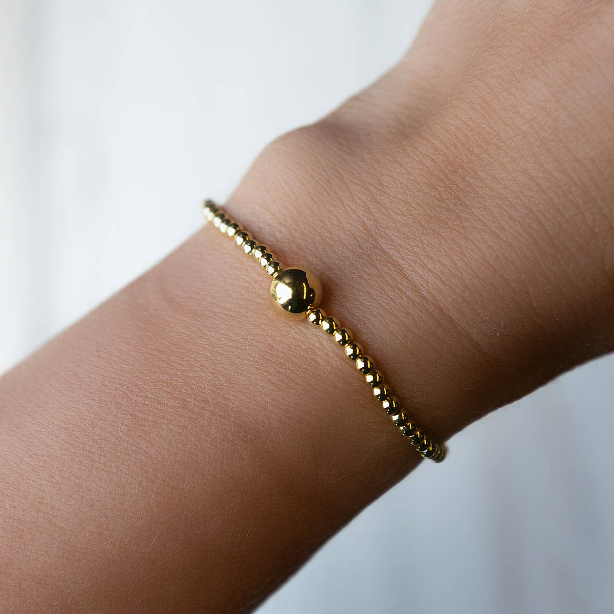 Uno Tarnish Resistant Gold Beaded Stretch Bracelet, Smooth